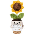 Crocheted sunflower in a pot with a motivational message on a white background