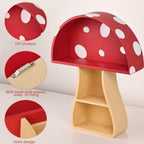Wooden shelf designed like a red mushroom with white spots, featuring DIY stickers and hooks.