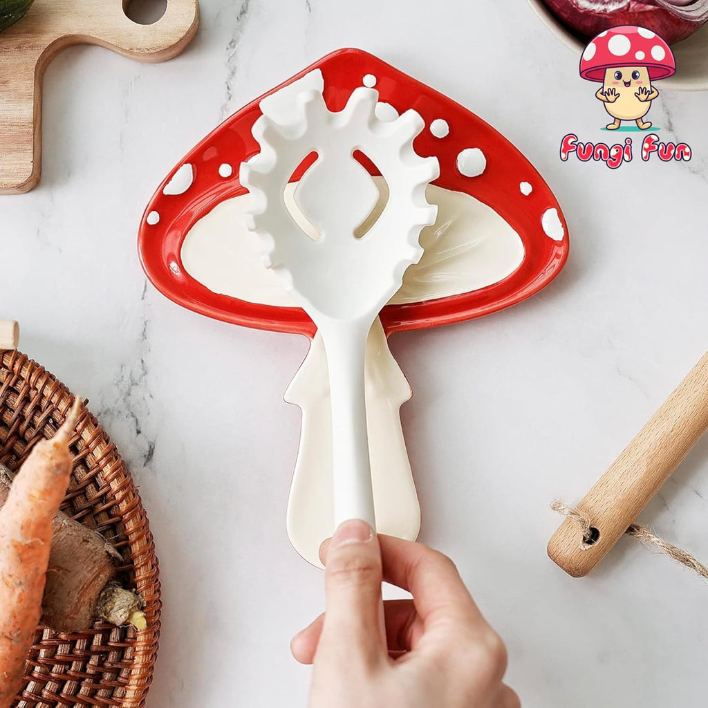 Mushroom-shaped kitchen tool with a hand holding it on a marble surface, featuring the brand 'Fungi Fun'.