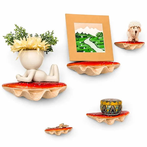 Set of decorative wall shelves with various items on a white background